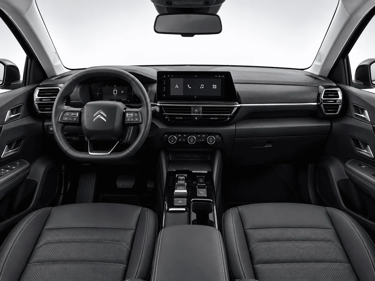 Citroen C4 X Lacivert kiralık araç iç mekânı — direksiyon, dijital gösterge ve otomatik vites konsolu